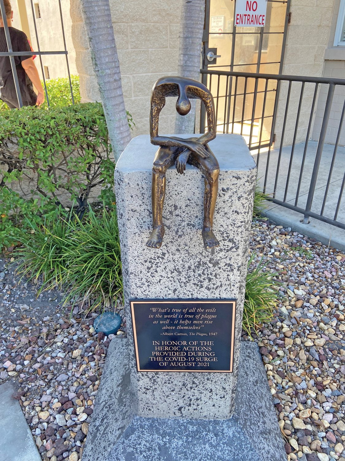 This is a photo of the COVID-19 memorial statue located outside the entrance of Hendry Regional Medical Center.